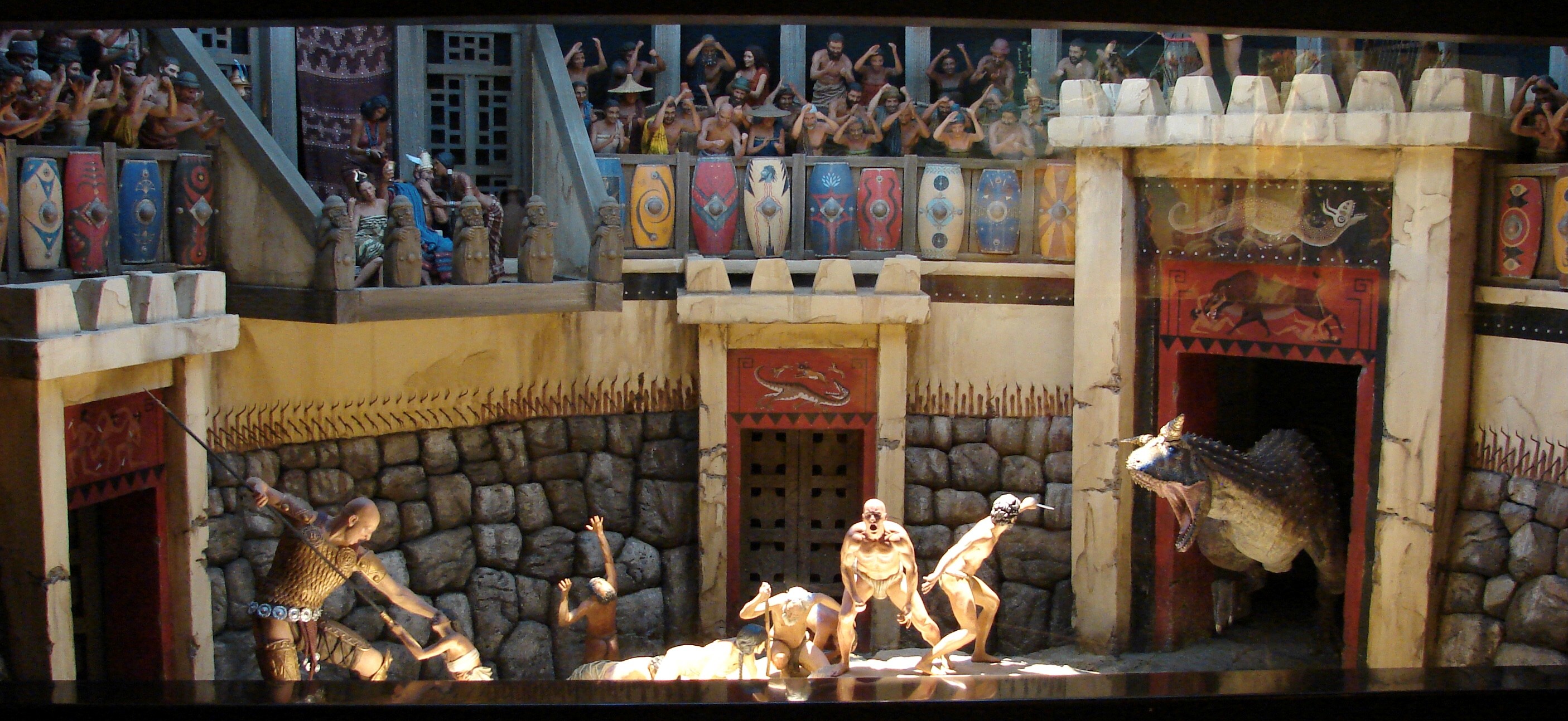 Death match between humans, giants and a dinosaur.