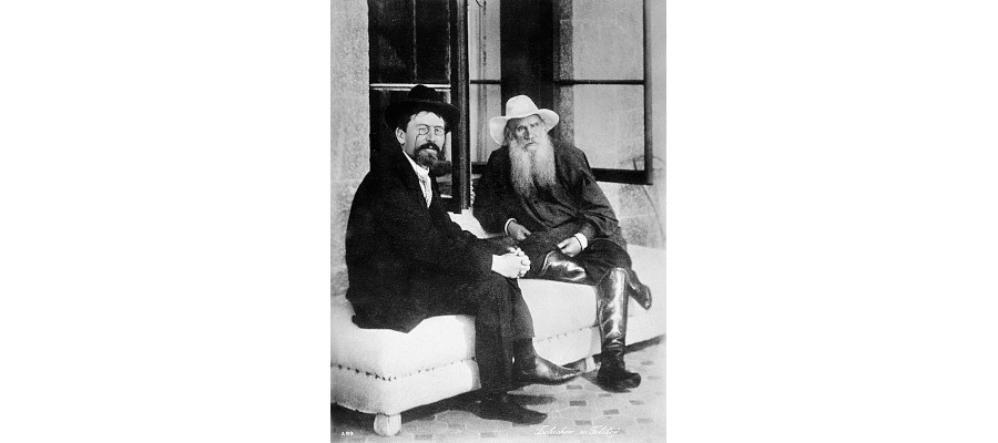 [Photo of Chekhov and Tolstoy discussing literature]